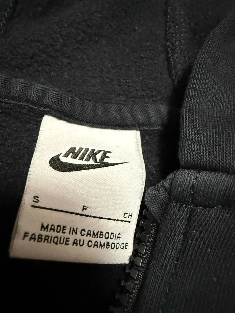 Nike black zip up youth hoodie size small.